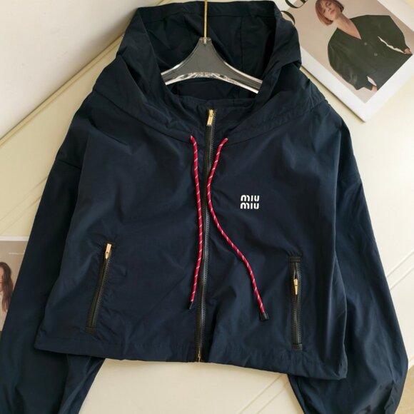 Miu Miu Jackets & Blazers - MIUMIU windbreaker, exquisitely tailored with a hood, combining workwear style w